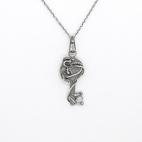 Srebrny naszyjnik kluczyk z symbolem Triskelionu