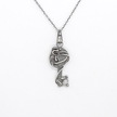 Srebrny naszyjnik kluczyk z symbolem Triskelionu (1)